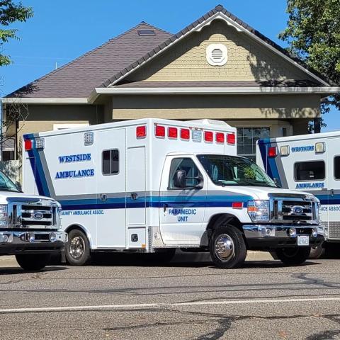 Westside Ambulances in front of house. 